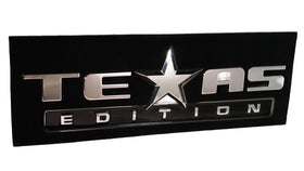Muzzys emblem installed on a truck tailgate demonstrating instant Texas Edition look