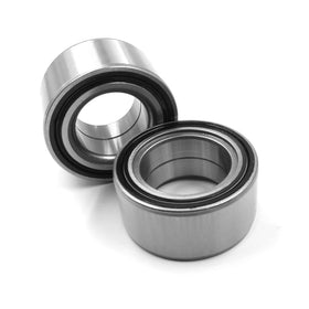 Nakuuly bearings next to coin for scale illustrating compact, accurate dimensions