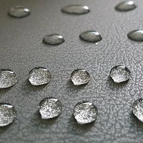 NANO Z COATING applied to boots in use, repels water and stains benefit