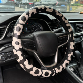 Naxizo front view of floral steering wheel cover shows bold pattern and fit benefit