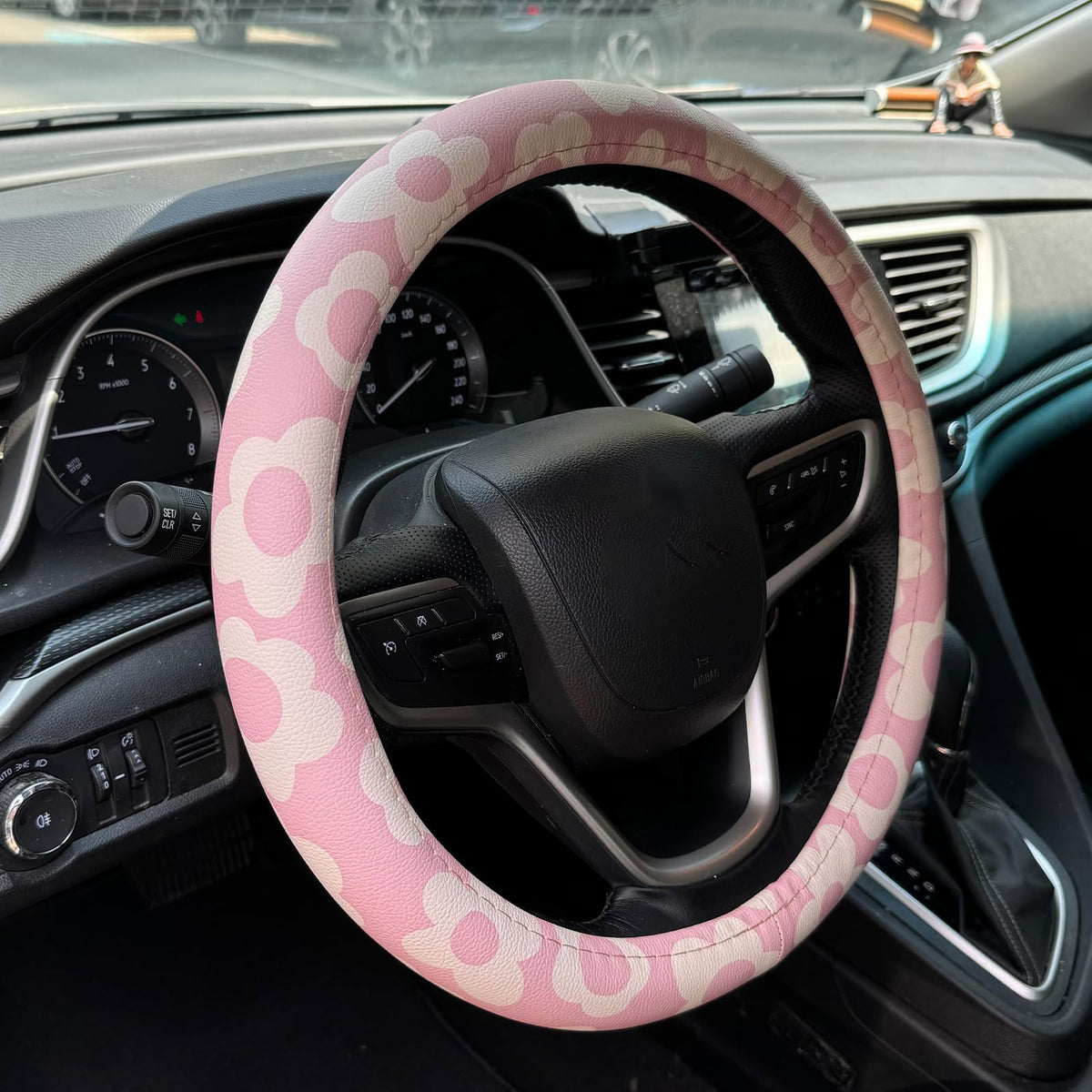 Naxizo front view of pink vintage groovy flowers steering wheel cover, adds style