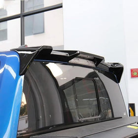 NeespoC spoiler on truck at night showcasing visual appeal and presence