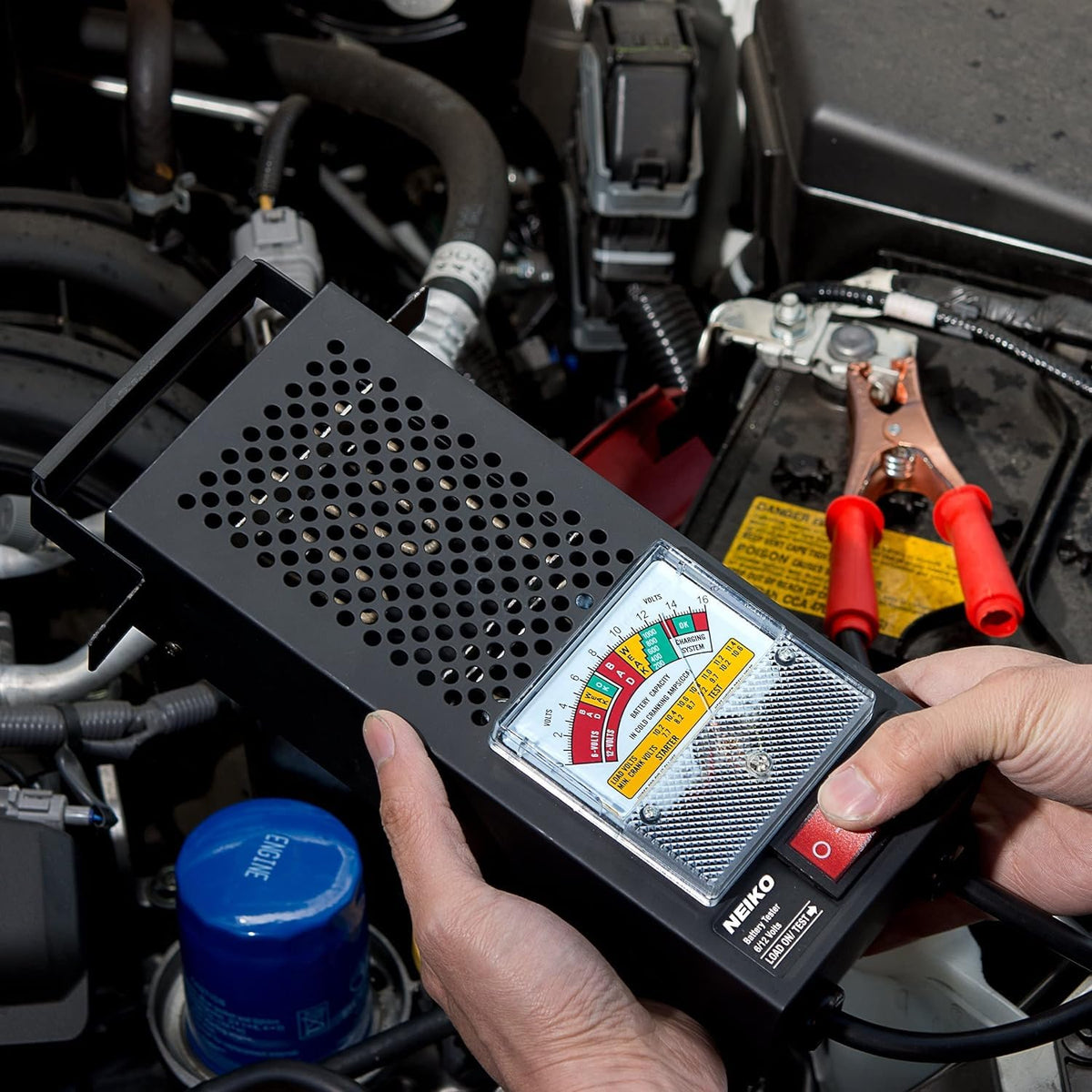 NEIKO 40510A held by hand to show portable size and workshop convenience