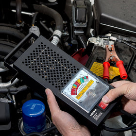 NEIKO 40510A held by hand to show portable size and workshop convenience