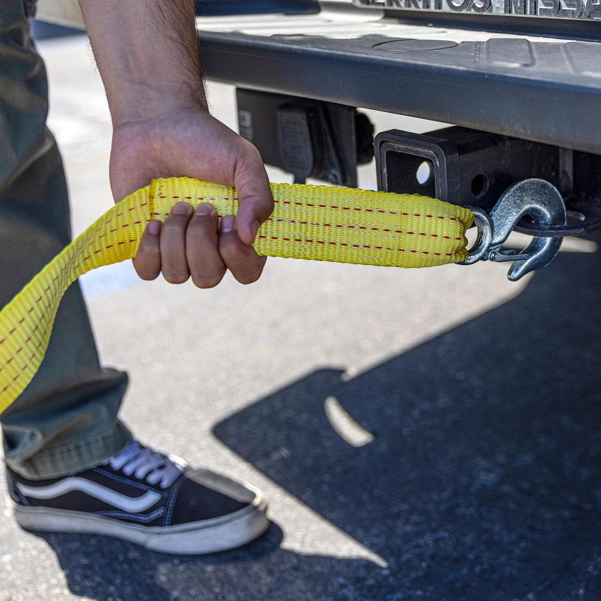 NEIKO tow strap in roadside kit beside tools illustrating emergency readiness