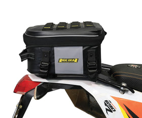 Nelson-Rigg packed on trail demonstrating rugged use and weather protection