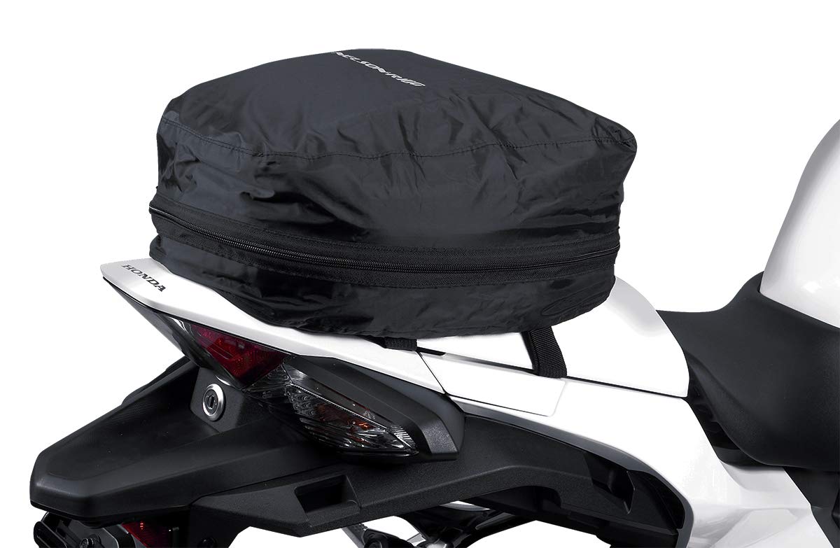 Nelson-Rigg tail bag mounted on a motorcycle in a commuting lifestyle scene