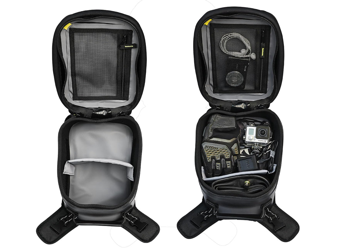 Nelson-Rigg mounted on adventure bike showcasing weatherproof use in outdoor terrain