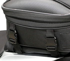 Nelson-Rigg waterproof rain cover deployed protecting bag from heavy weather