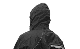Nelson-Rigg rain suit worn by rider during commute protecting against heavy rain
