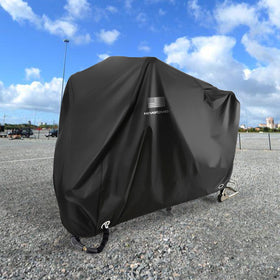 NEVERLAND covered motorcycle in driveway illustrating all-weather outdoor protection