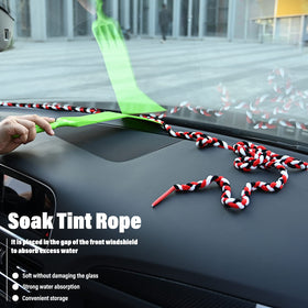 NEWISHTOOL in use at a car window keeping tinting fluid contained and protected