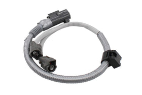 NewYall knock sensor installed on engine bank illustrating direct-fit replacement benefit