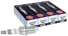 NGK 2667 front packaging showing four iridium spark plugs and model labeling for easy identification
