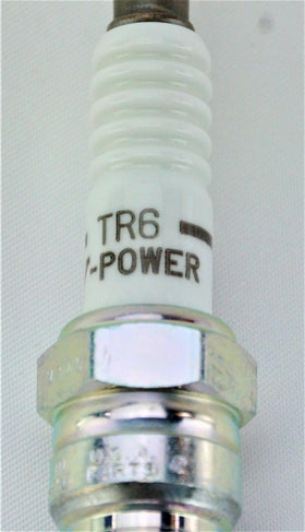 NGK 4177 TR6 copper-core cutaway illustrating high conductivity and heat transfer
