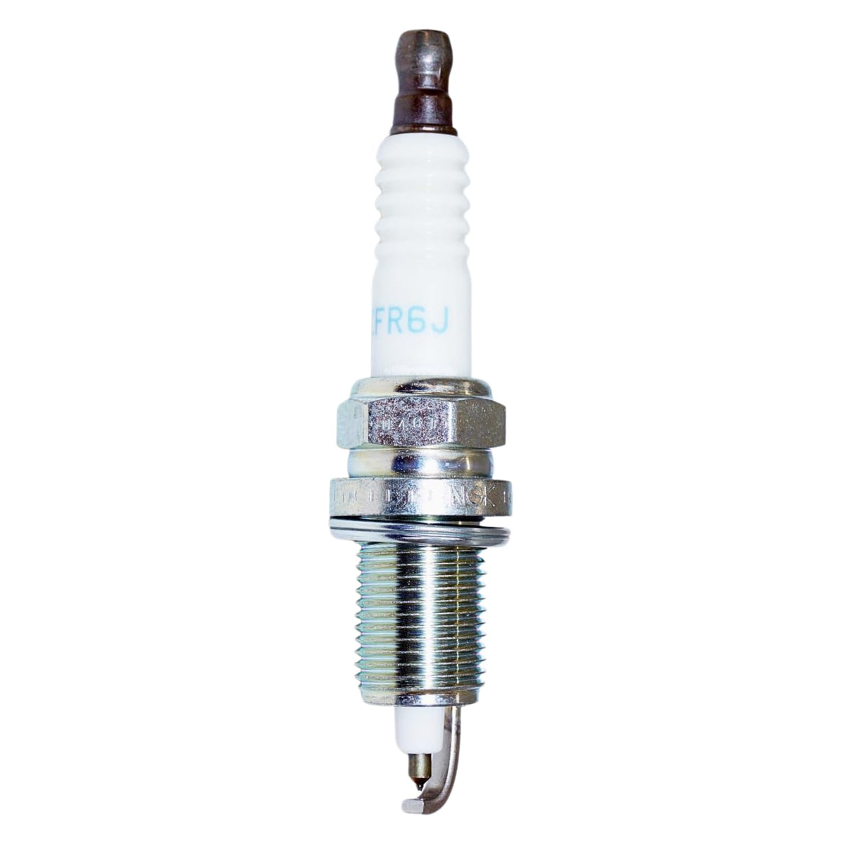 NGK spark plug installed in Mercury outboard cylinder head showing correct fit and reliability