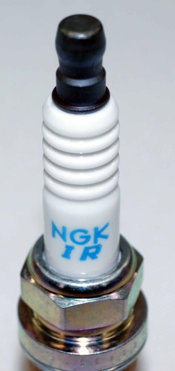 NGK spark plug held in hand showing size and scale for confident fit confirmation