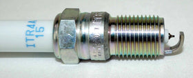 Open box showing eight NGK 5599 plugs emphasizing complete set and ready-for-service convenience
