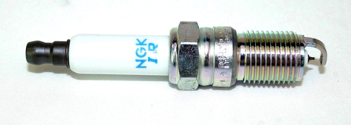 NGK spark plug side view showing thread reach and fitment for correct engine installation