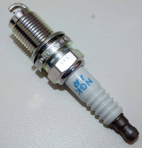 NGK plug next to ruler demonstrating correct dimensions for fitment