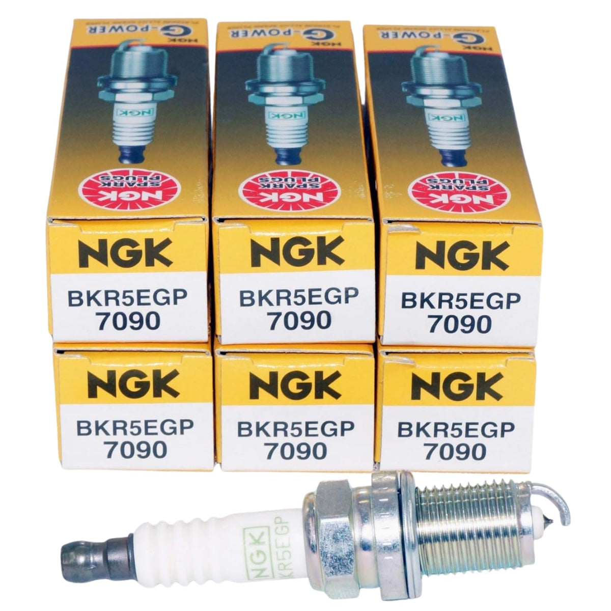 NGK 7090 pack front view showing six plugs and brand, reliable replacement