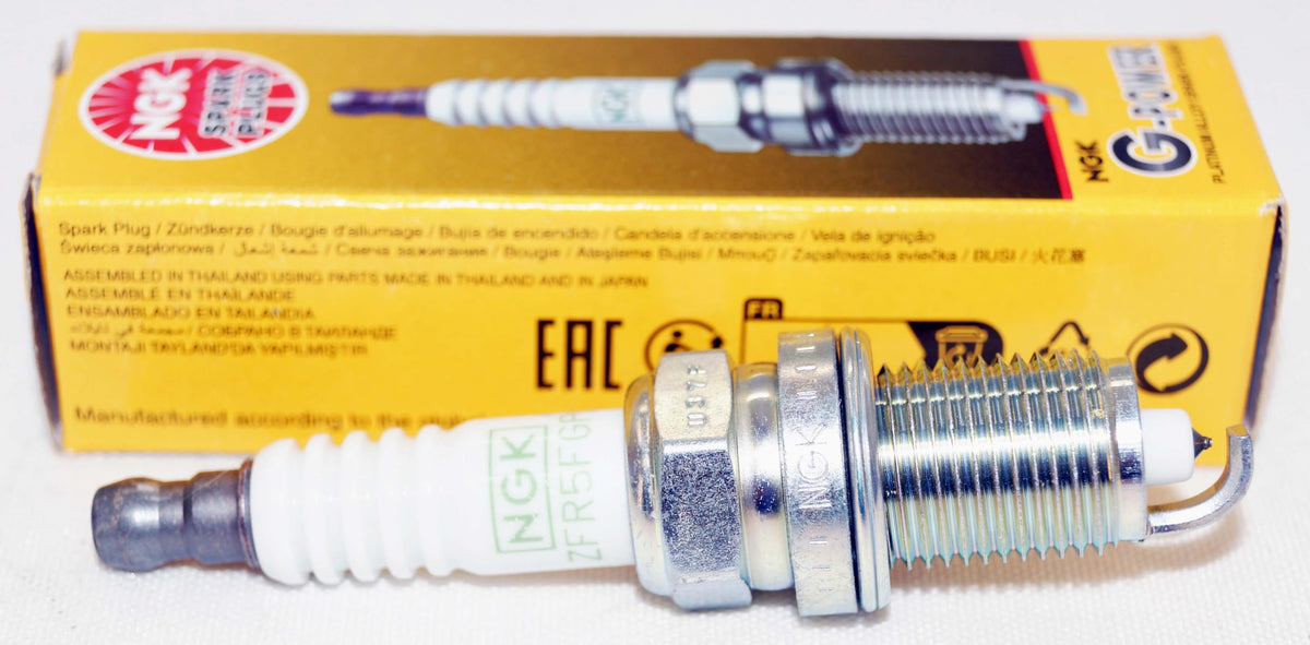 NGK six ZFR5FGP spark plugs displayed highlighting uniformity and reliability