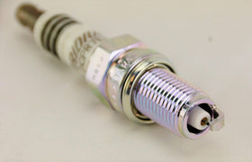 NGK iridium electrode close-up highlighting fine tip for consistent spark