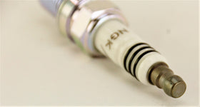 NGK side label detail showing DCPR7EIX part number and OEM fit verification