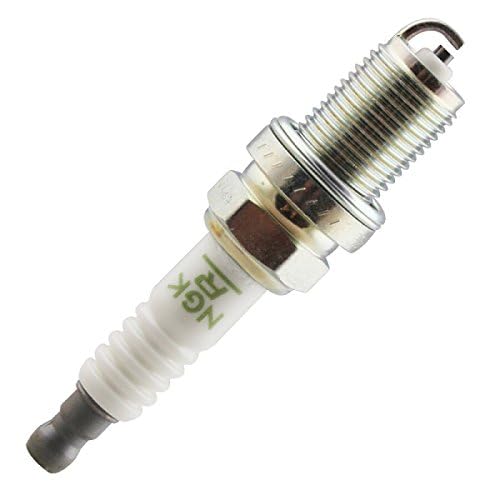 NGK BKR6E spark plug installed in engine cylinder demonstrating proper fit and performance