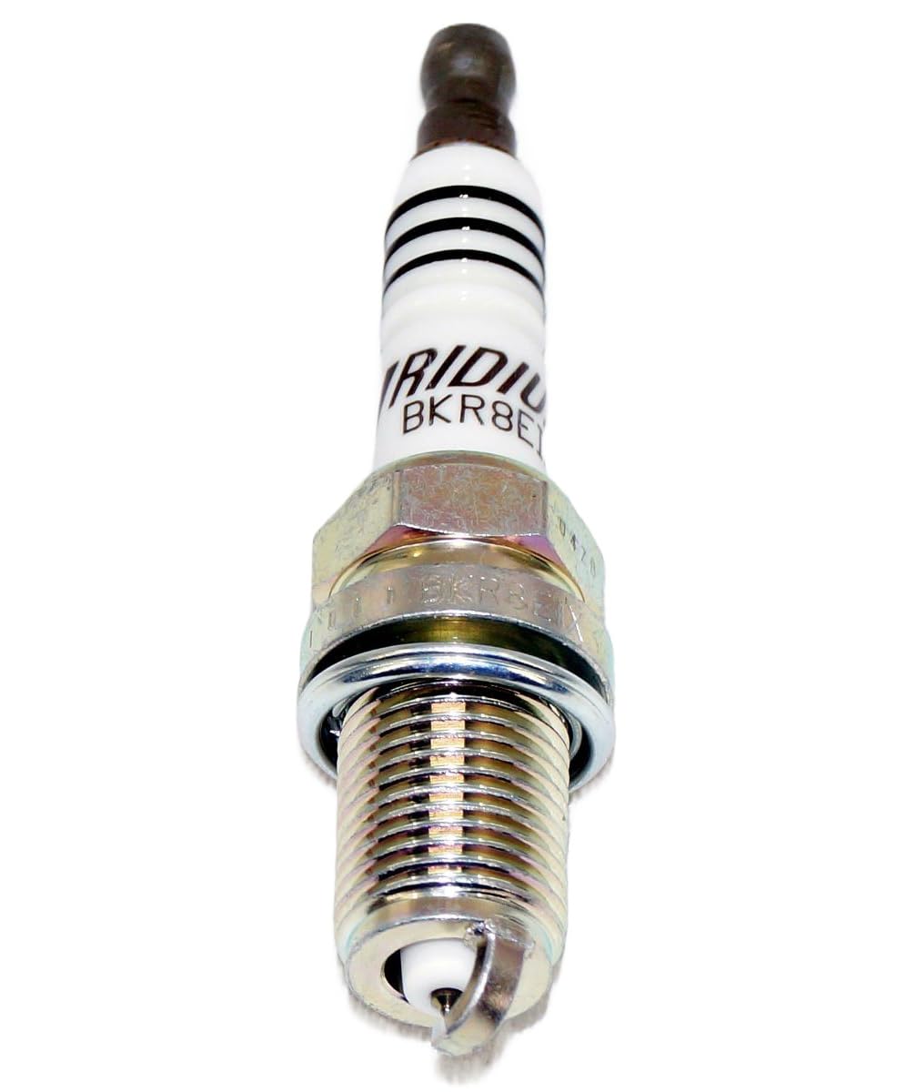 NGK BKR8EIX beside ruler showing size and thread reach for correct installation