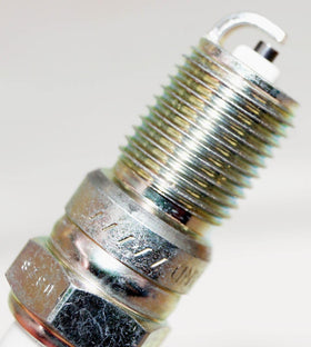 Open pack of eight NGK BPR6EFS plugs illustrating complete set for multi-cylinder service