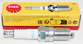NGK spark plug close-up of electrode and ceramic insulator highlighting reliable spark delivery