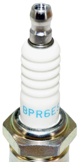 NGK BPR6ES installed in an engine cylinder head — correct fit and function benefit