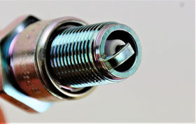 NGK BR8ES electrode detail showing tip and gap for reliable spark visibility benefit
