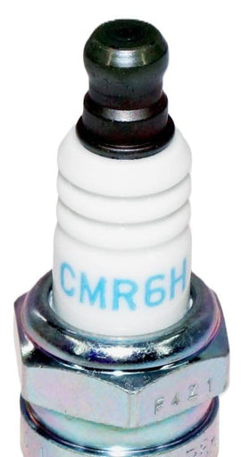 NGK CMR6H thread and triple gasket close-up preventing combustion gas leaks