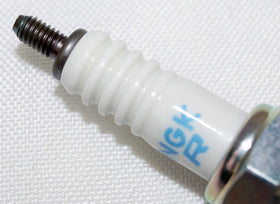 NGK CR7E original packaging label close-up showing NGK authenticity and correct part number
