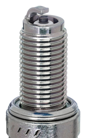 Close-up of NGK CR9EB electrode and ceramic insulator illustrating durable construction and reliable spark