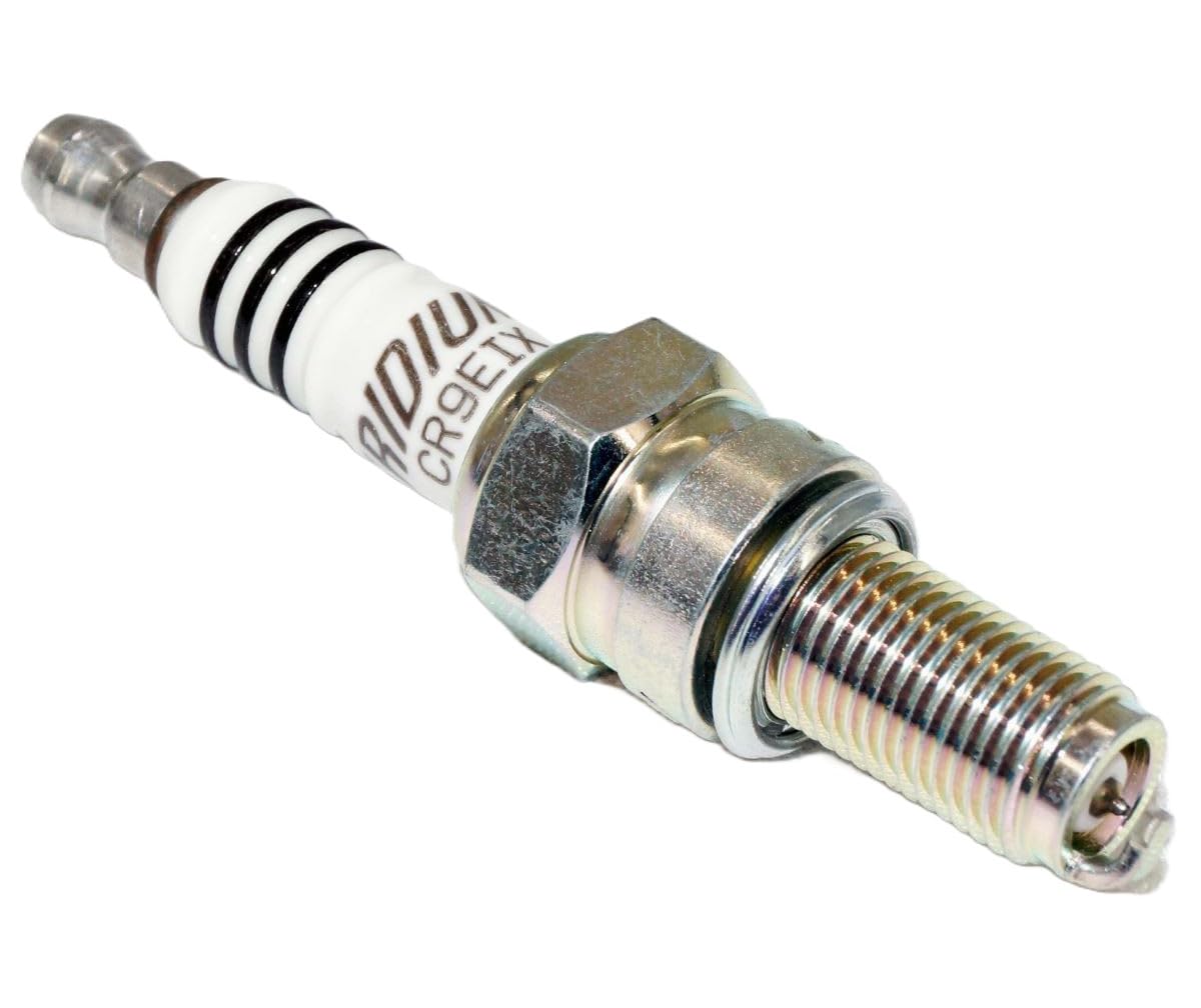 NGK CR9EIX installed in engine spark plug well showing correct fitment benefit