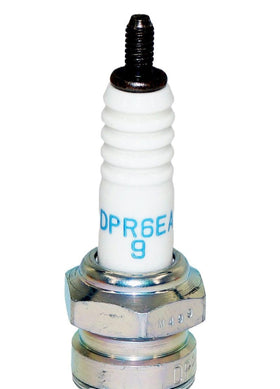 NGK DPR6EA-9 ceramic insulator detail demonstrating high dielectric strength