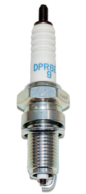 NGK DPR6EA-9 installed in motorcycle engine illustrating easy replacement benefit