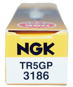 NGK eight plugs laid out showing full set for multi‑cylinder service