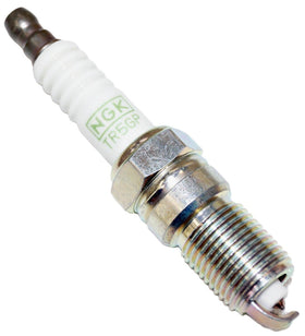NGK plug installed in engine showing easier replacement and fit