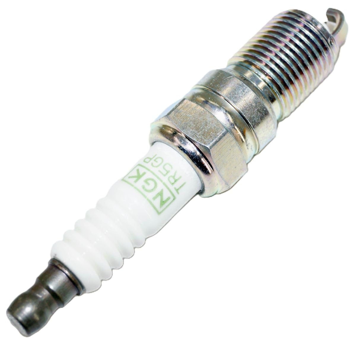 NGK plug beside ruler showing compact size and correct fitment