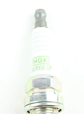 NGK G-Power plugs held in hand illustrating true size and scale