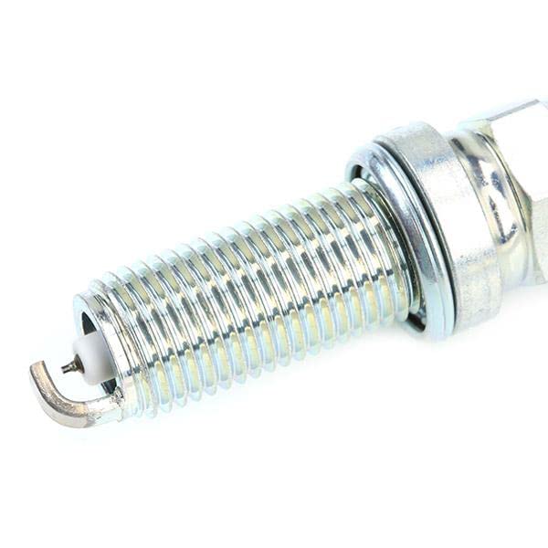 NGK ILKAR7L11 next to ruler showing compact size and thread detail