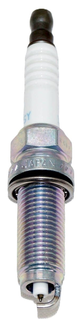 NGK four plugs laid out emphasizing value for multi‑cylinder service