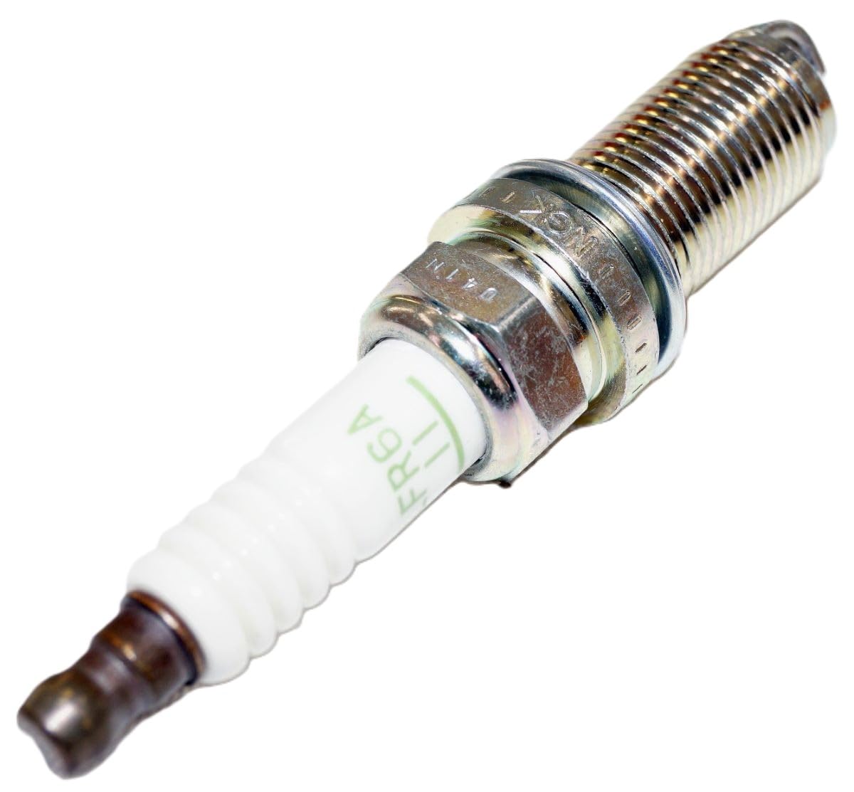 NGK spark plug being installed in engine illustrating proper replacement benefit