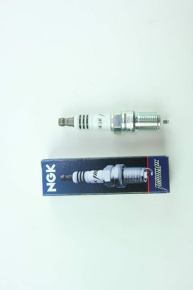 NGK spark plug installed in engine cylinder head demonstrating proper fitment and reliability
