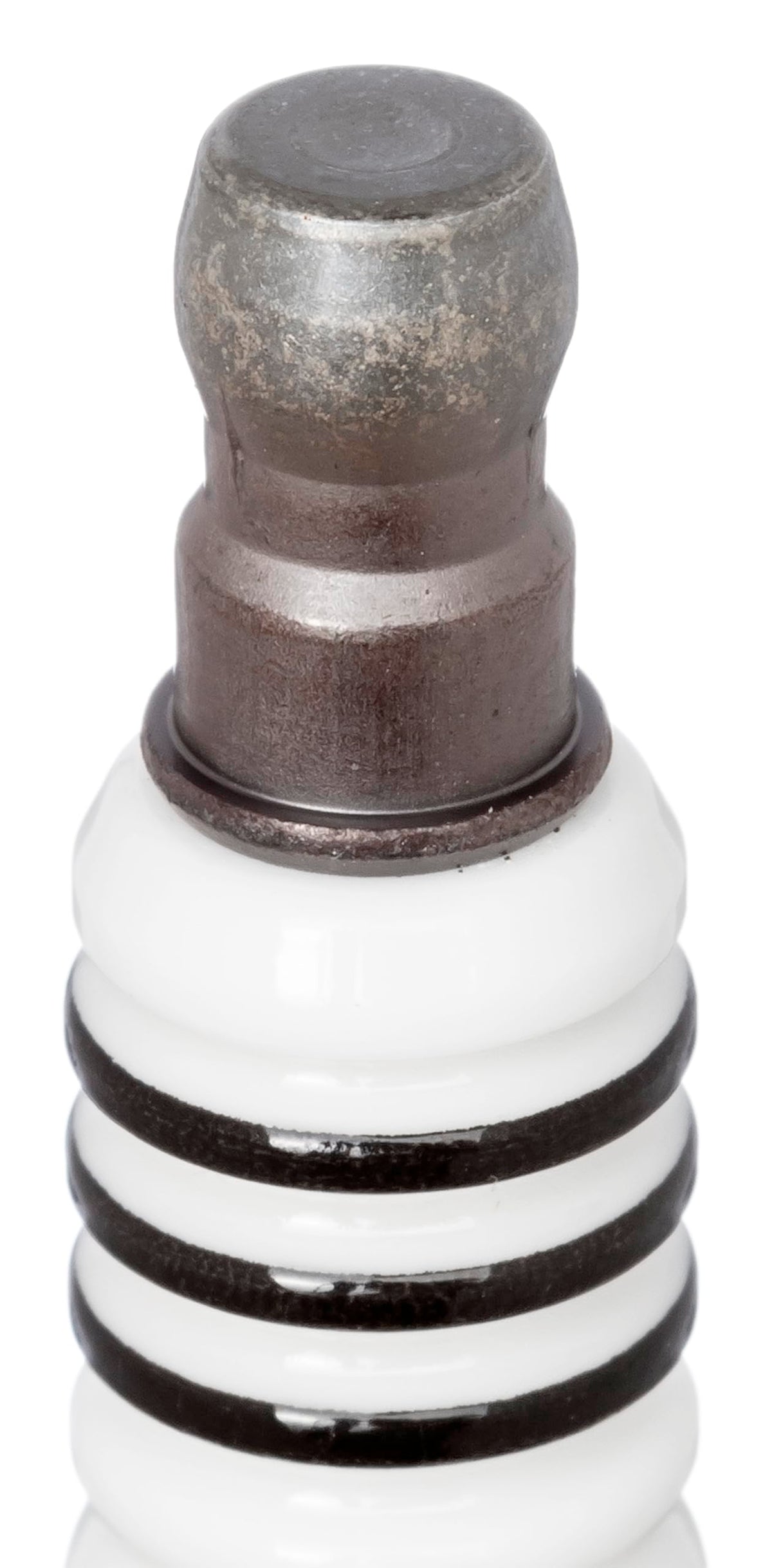 NGK spark plug installed in engine illustrating reliable ignition performance