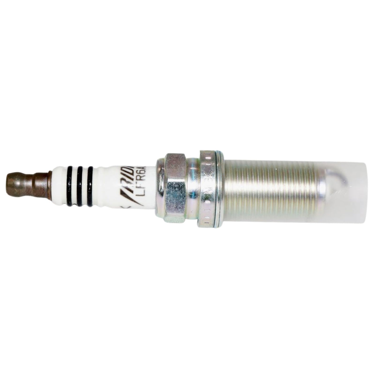 Technician installing NGK spark plug demonstrating straightforward replacement and reliable fit